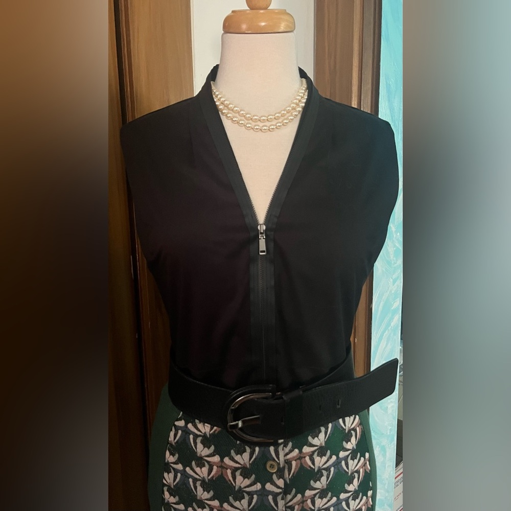 Elie Tahari “Laura” zip front sleeveless blouse.